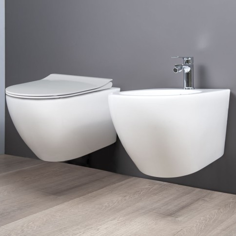 Wc sospeso serie cover rimelss con sedile e fissaggio althea